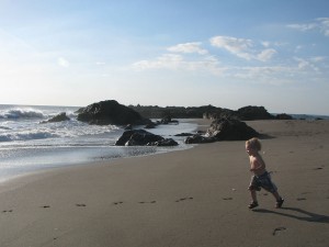 josiah, always full of energy, running on the beach