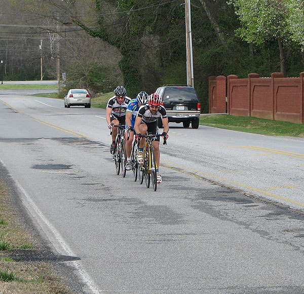 Brian leading the break as it's been trimmed down to just three.
