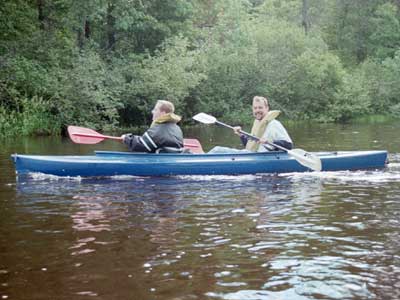 Best man Matthew and groom Brian kayaking on the Namakogen. The wedding party and friends and family spent Friday morning on a fun boating adventure in the northwoods of beautiful Northwest Wisconsin. 
LARGE PHOTO NOT AVIALBLE