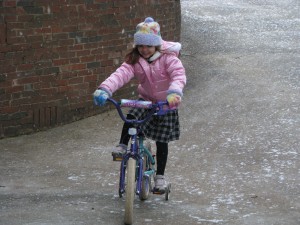 Analise doing a warm-up lap in our driveway