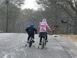 Biking together on the way to drop off Analise off at school