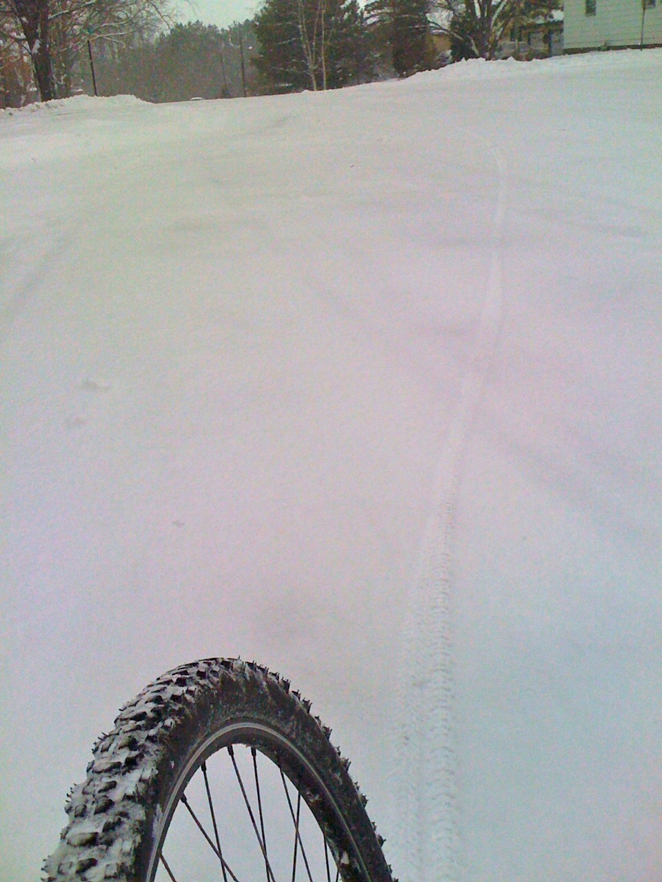 Mountain bike track through the snow